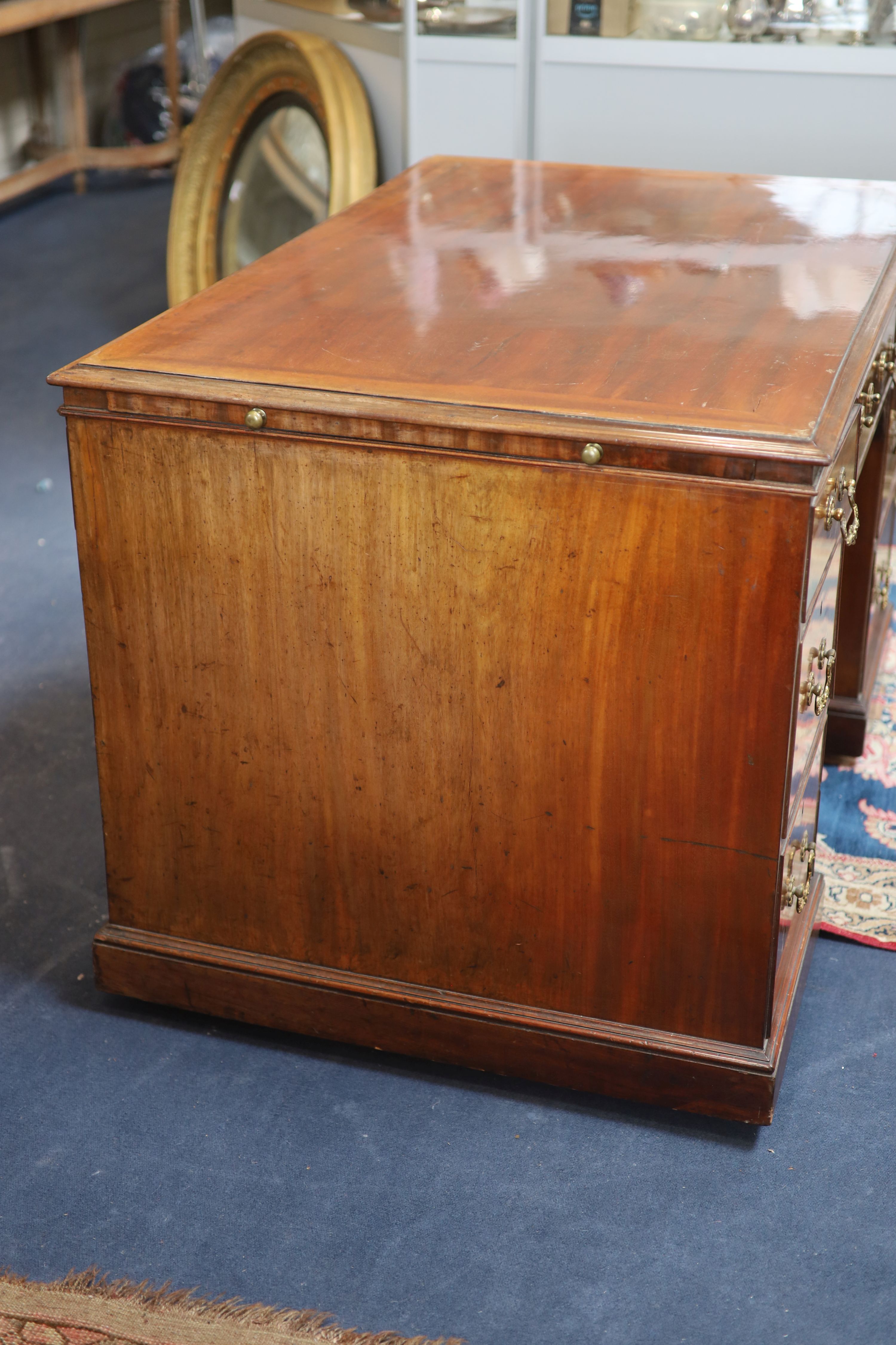 A George IV mahogany kneehole desk by William Williamson & Son of Guildford, second quarter 19th century width 125cm depth 79cm height